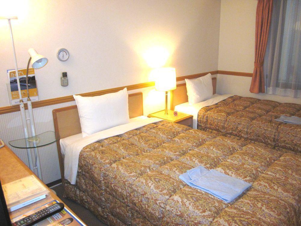 Toyoko Inn Hakata-Guchi Ekimae Фукуока Номер фото